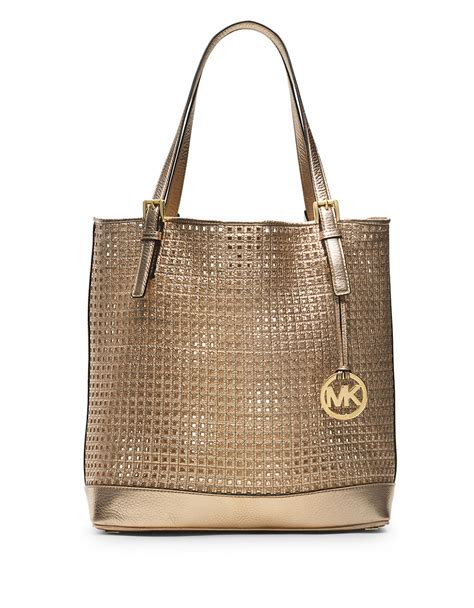 michael kors large round gold medallion on front of bag|Michael Kors Medallion Bags .